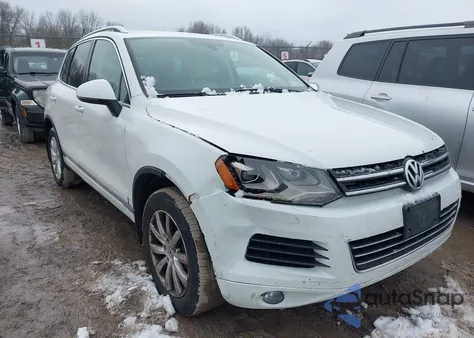 2012 Volkswagen Touareg Vr6 Sport z USA, uszkodzony, nr VIN WVGEF9BP1CD006725